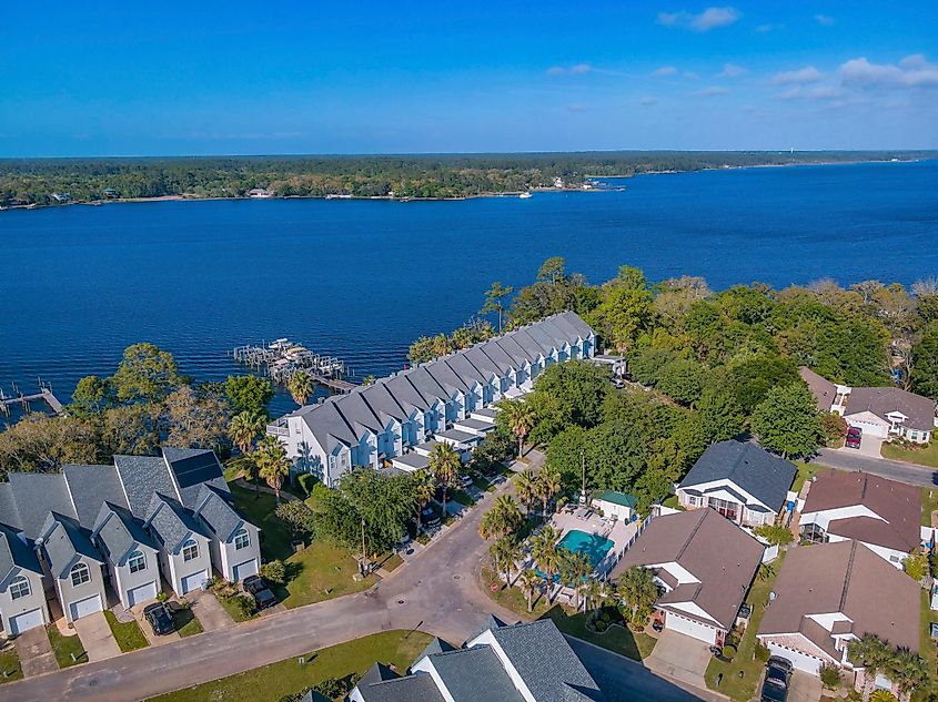 Townhouses and condos with a view of the scenic blue bay in Navarre, Florida.