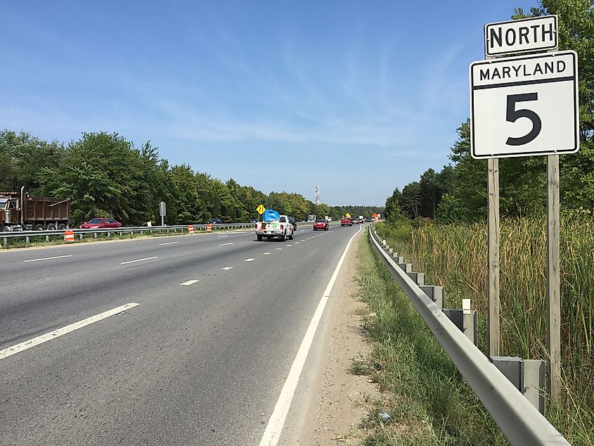 Northward view along Maryland State Route 5 (Branch Avenue) at Brandywine Road in Brandywine, Prince George's County, Maryland, showing multiple lanes, traffic signals, and roadside businesses.