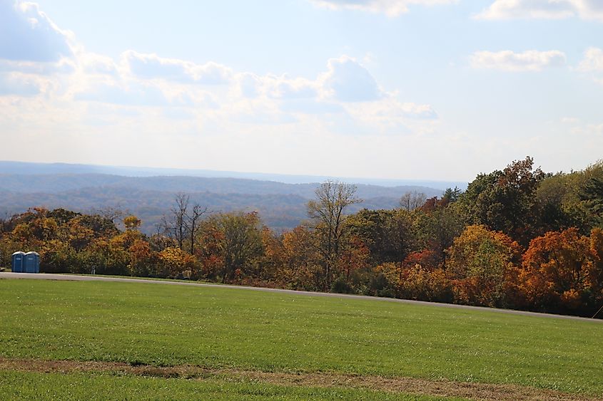 View from Bald Knob Cross of Peace overlooking the rolling hills and fall foliage of Shawnee National Forest in Southern Illinois
