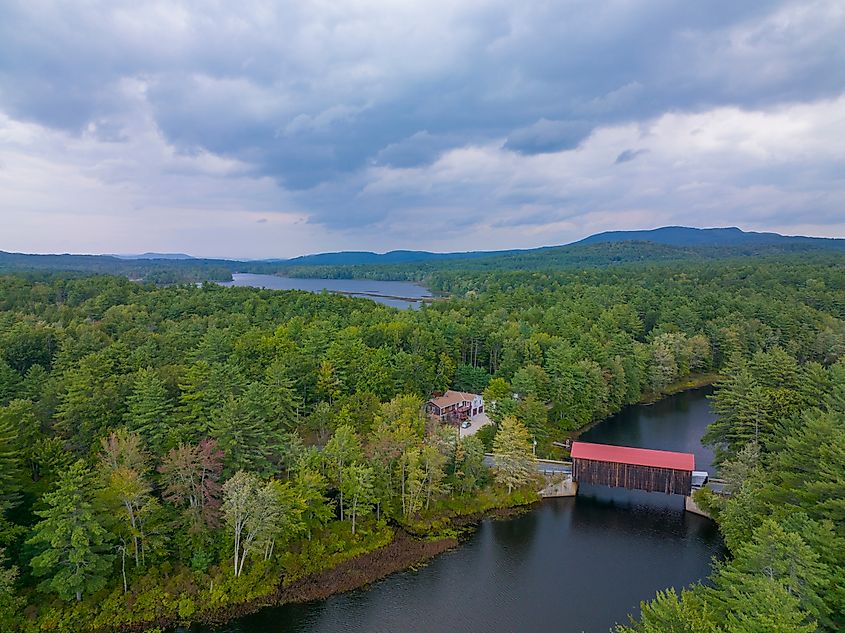 Hancock Greenfield Covered Bridge aerial view on Cantoocook River between town of Hancock and Greenfield in New Hampshire, USA.