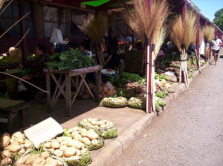 A market in Nuku'alofa, the capital of Tonga, where women and men shop. Image Credit Pilgrim81 via Wikimedia.