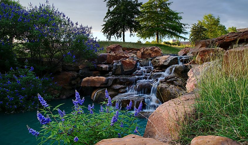 Waterfall in a beautiful park in Frisco. 