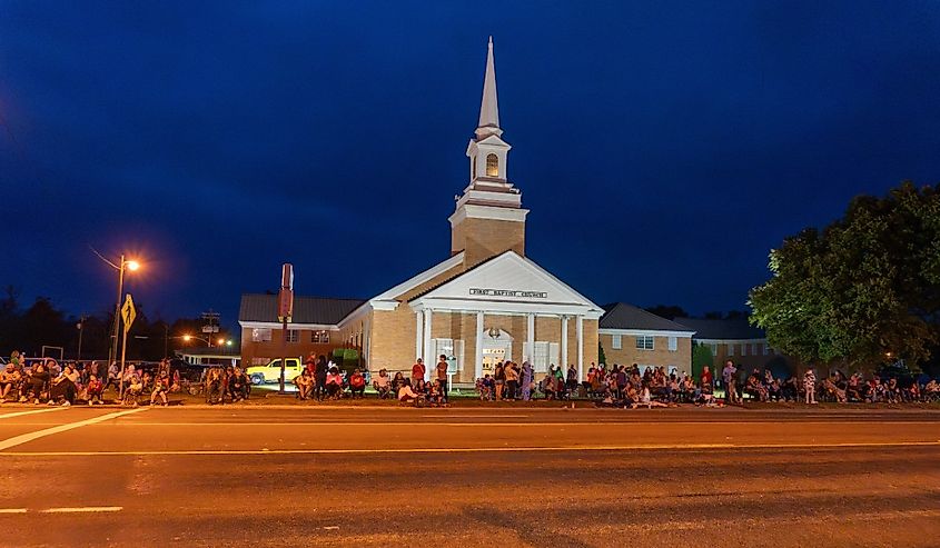 People lined up on the Main Street in Front of a Church for the Annual Christmas Parade in Silsbee, Texas.