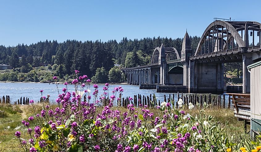 Beautiful view of Siuslaw River Bridge and the river in historic old town Florence, Oregon.