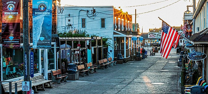 Ocean Beach, New York: Early morning view of downtown Ocean Beach on Fire Island as the sun rises over the businesses.