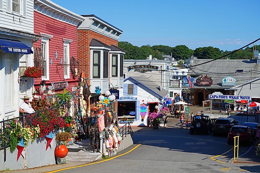 Businesses lined along a street in Boothbay Harbor, Maine.