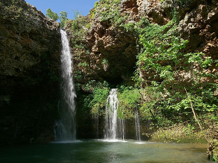 Beautiful 77-foot waterfalls at the Natural Falls State Park, West Siloam Springs, Oklahoma.