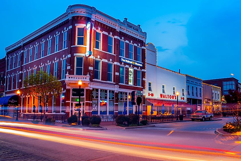 Time exposure of car lights passing in front of the Walmart Museum and Sam Walton's first store in Bentonville, Arkansas