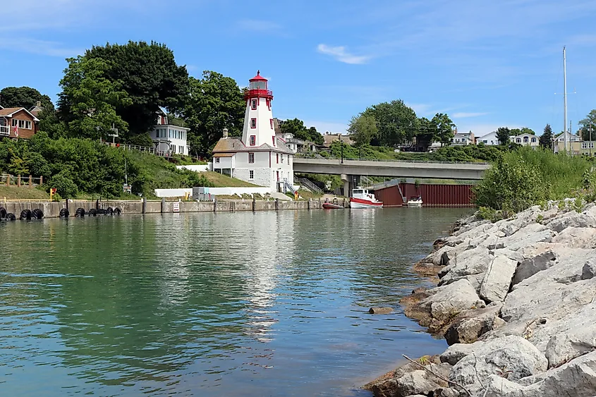 Kincardine, Ontario Lighthouse reflects in pristine inlet of Lake Huron