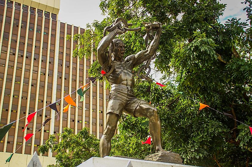 Lusaka, Zambia: Freedom Monument - a man breaks the chains of slavery.