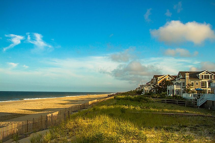 View of the beach with houses in Bethany Beach, Delaware.