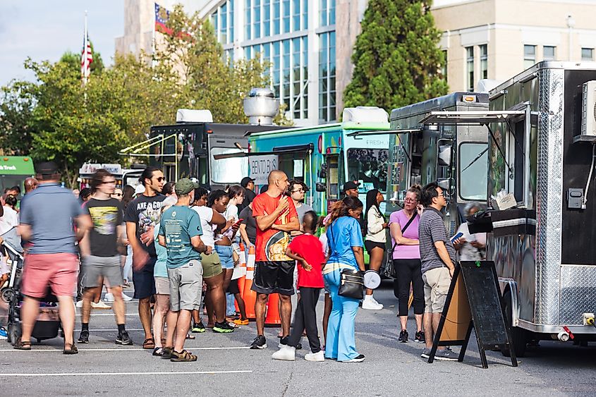 Suwanee, Georgia: People stand in line waiting to be served at Food Truck Friday.