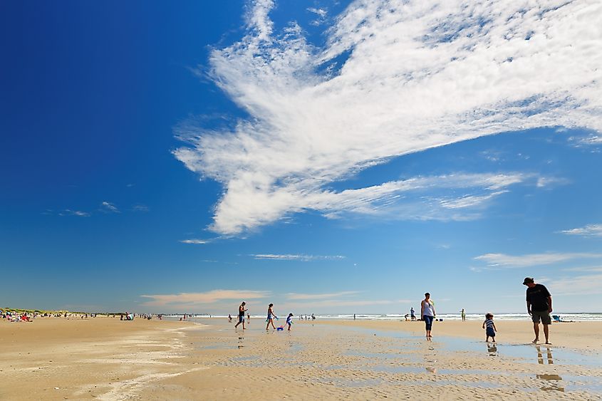 Tourists walking on the Ogunquit Beach, Maine.