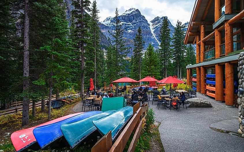 Moraine Lake Cafe in Banff National Park with snow-covered peaks of the Canadian Rocky Mountains.