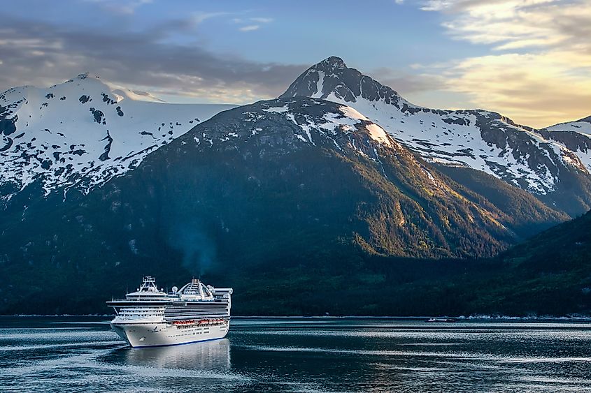 A cruise ship travelling through the Inside Passage. Image credit Ruth Peterkin via Shutterstock.