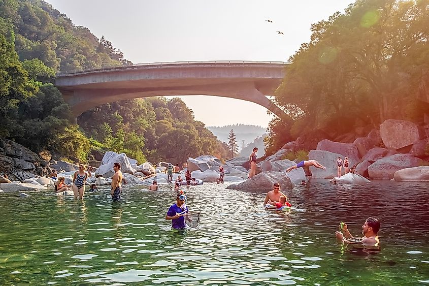 People are swimming in the South Yuba River in Nevada City, California.