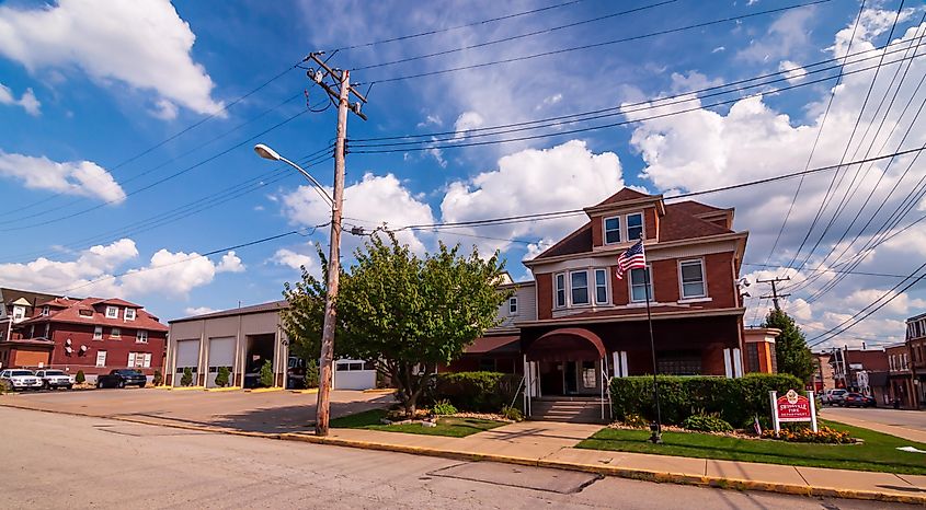 The Swissvale Volunteer Fire Department building on Irvine Street on a sunny, summer day, via woodsnorthphoto / Shutterstock.com