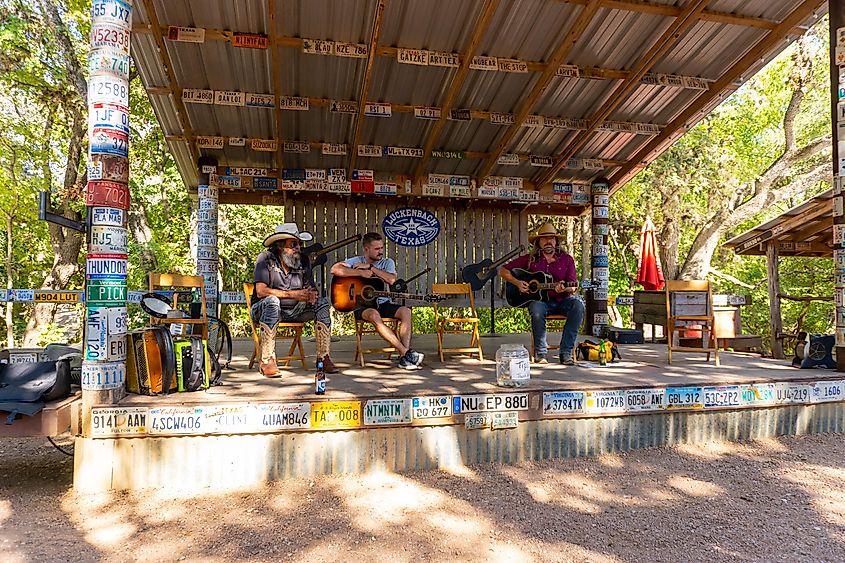 Performers playing music in Luckenbach, Texas.