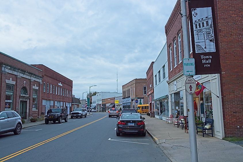 Market Street lined with red brick buildings in Onancock, Virginia.
