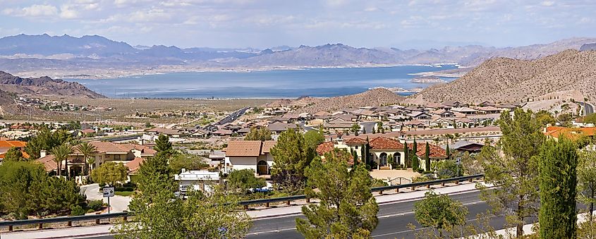 Boulder City, Nevada suburbs, and Lake Meade with the panorama of surrounding mountains.