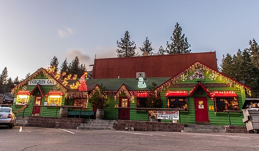 Evergreen Cafe and Racoon Saloon decorated in Christmas holiday lights on Evergreen Rd in Wrightwood, California.