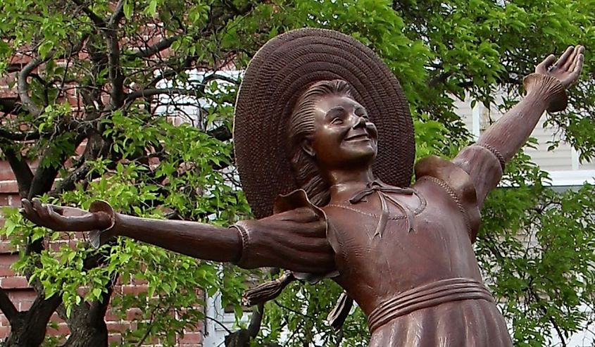 Detail of bronze statue of Pollyanna in front of the public library of Littleton, New Hampshire.