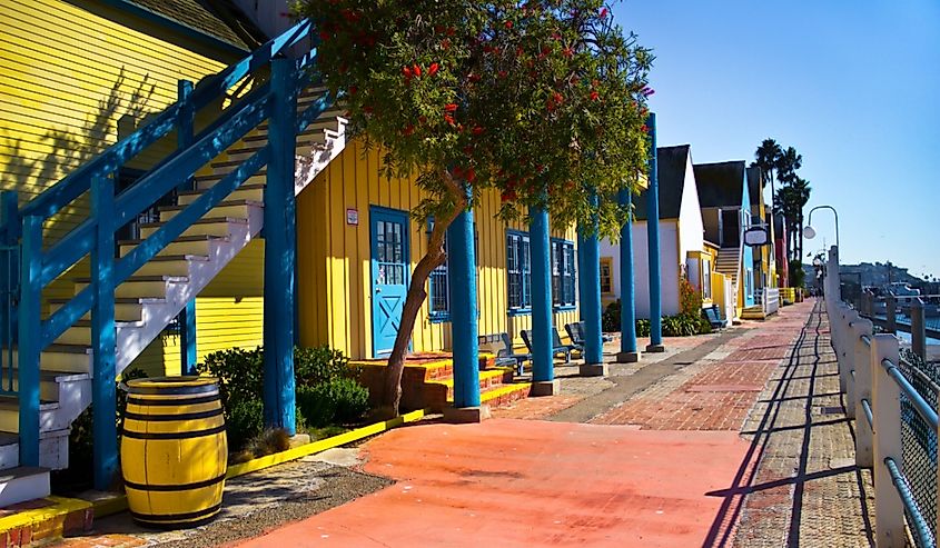 Fisherman's Village has colorful storefronts and a wide brick walk in Marina Del Rey, California.