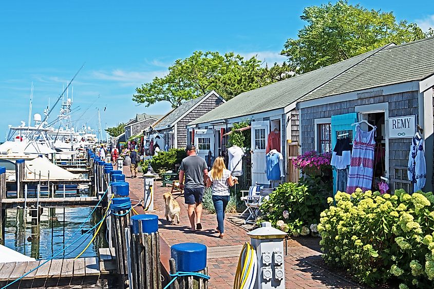 A row of eclectic stores can be found next to the harbor in Nantucket