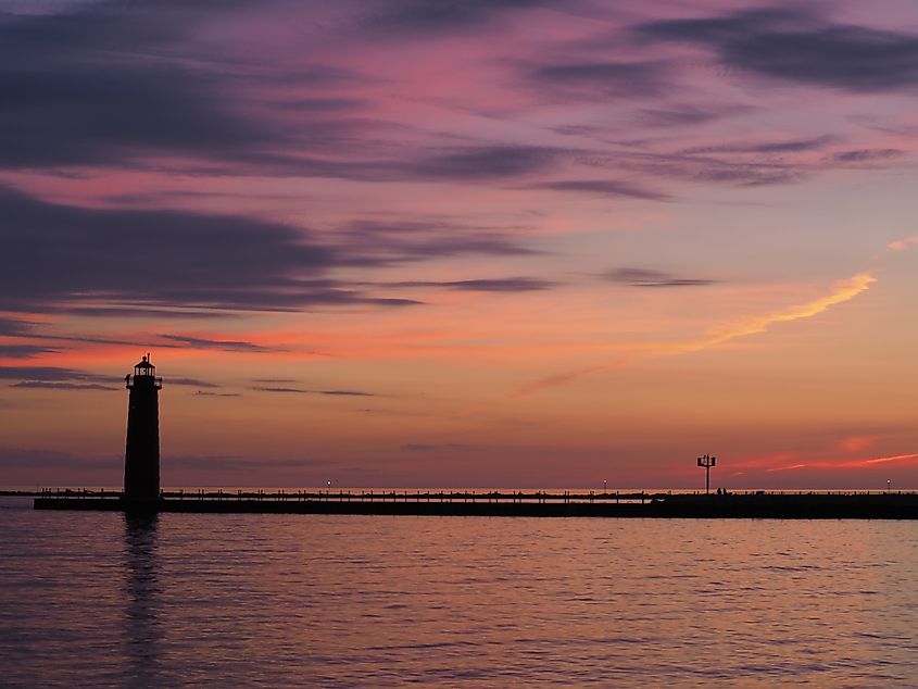 Muskegon Michigan Lighthouse with multicolored sunset.