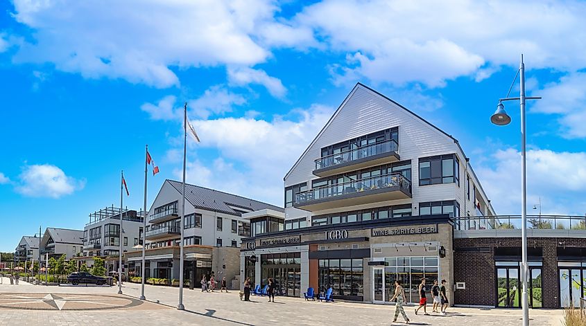 Scenic Innisfil town in Ontario and lake promenade with marina views, shops, cafes and restaurants. Editorial credit: eskystudio / Shutterstock.com