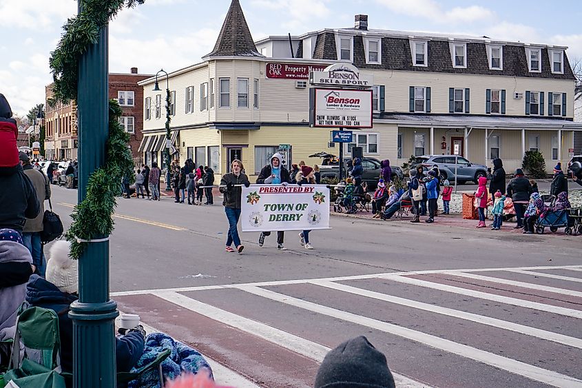 People celebrating the Annual Nutfield Holiday Parade in Derry, New Hampshire.