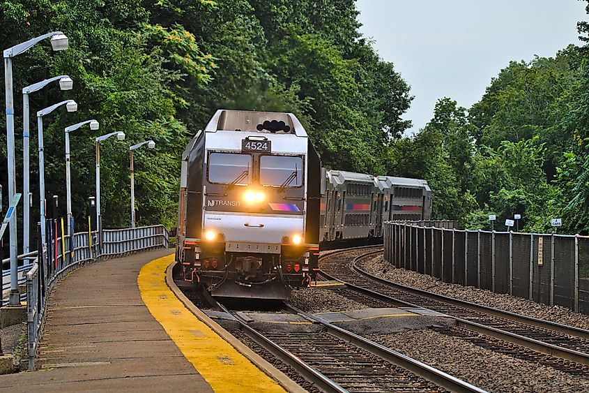 New Jersey Transit Transit departing from Ho Ho Kus station on a summer day. 