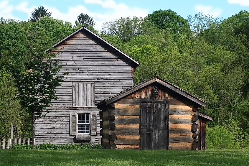 Editorial Phot Credit: Alexandar Iotzov via Shutterstock. Abandoned houses of first settlers and early years miners in Lewisburg West Virginia USA.