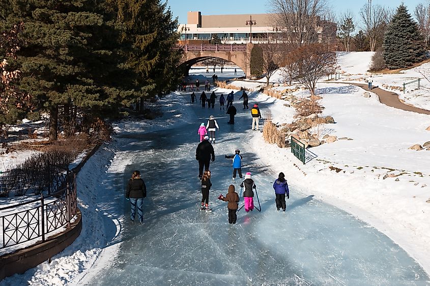 People ice skating on a frozen lake, Minnesota,