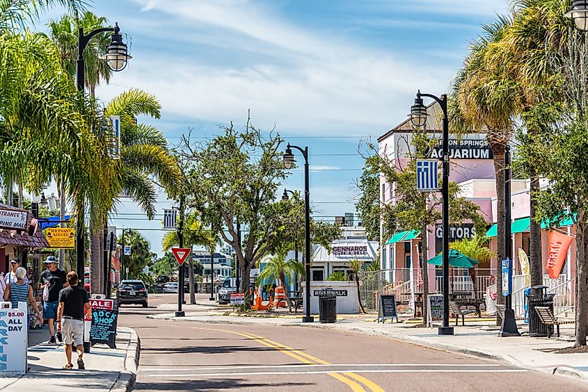  Dodecanese boulevard street road with signs for stores shops and aquarium in Tarpon Springs. Editorial credit: Kristi Blokhin / Shutterstock.com