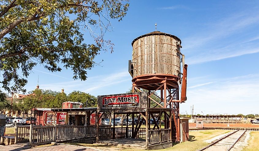 Watertank and rails at the old train station at the stockyards in Fort Worth, Texas.