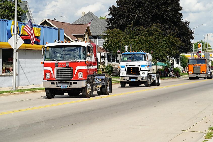 Semi truck parade driving down the main street of Waupun, Wisconsin