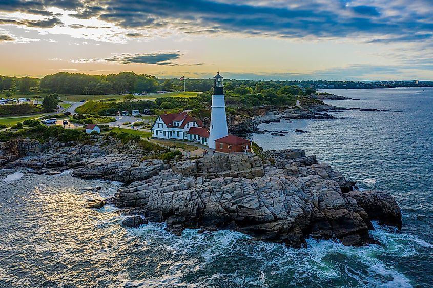 Aerial view of the Portland Head Lighthouse at sunset at Fort Williams Park in Cape Elizabeth, Maine