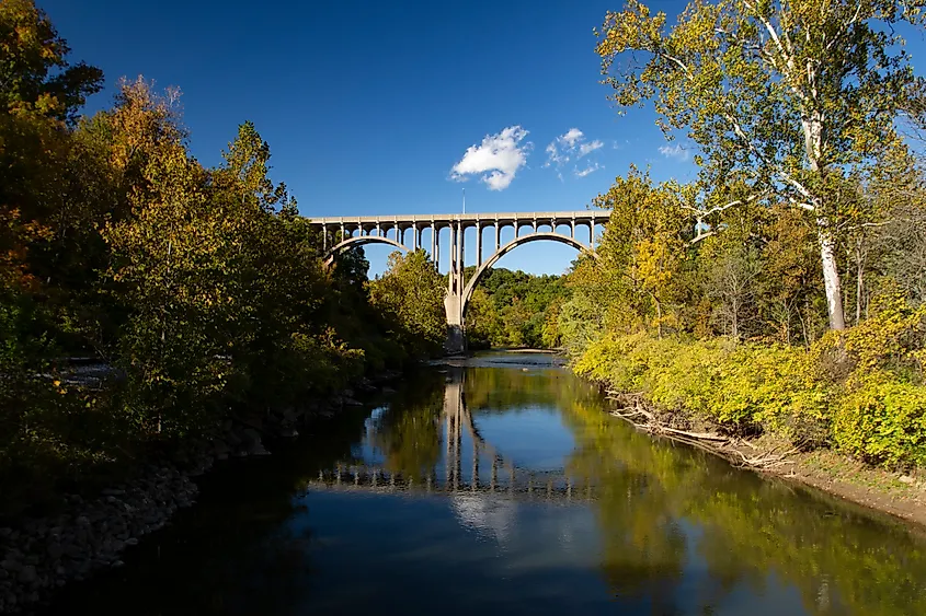 Editorial Photo Credit: RJSPhotography via Shutterstock. View of the Route 82 Bridge Over the Cuyahoga River Looking North from the Station Road Bridge Along the Towpath Trail