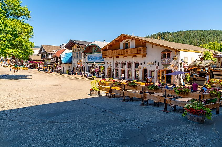 Bavarian themed buildings with shops and cafes near the along the main street of the touristic resort town of Leavenworth, Washington, USA. Editorial credit: Kirk Fisher / Shutterstock.com