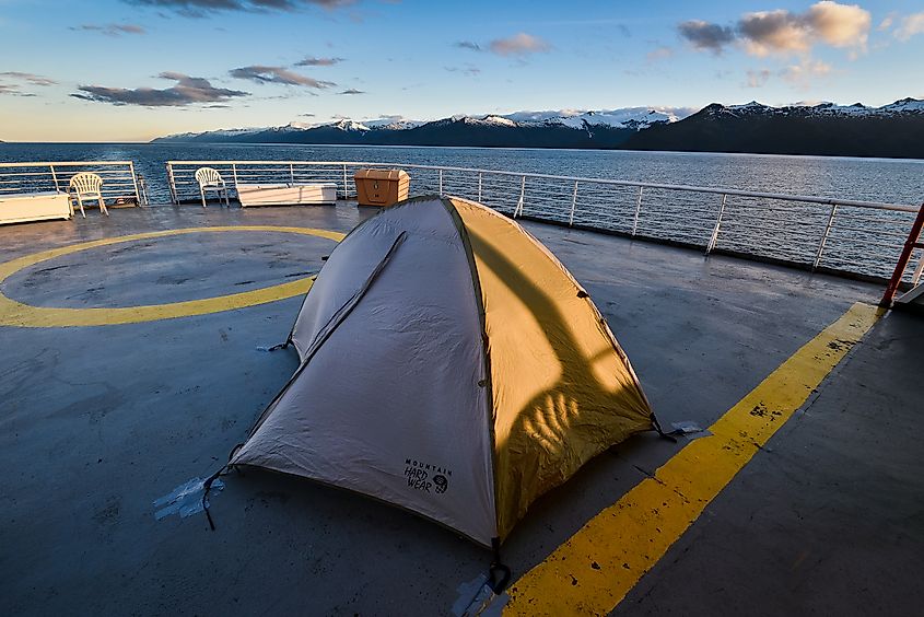 Riding the ferry system with Alaska's marine highway along the inside passage: a tent pitched on the deck.