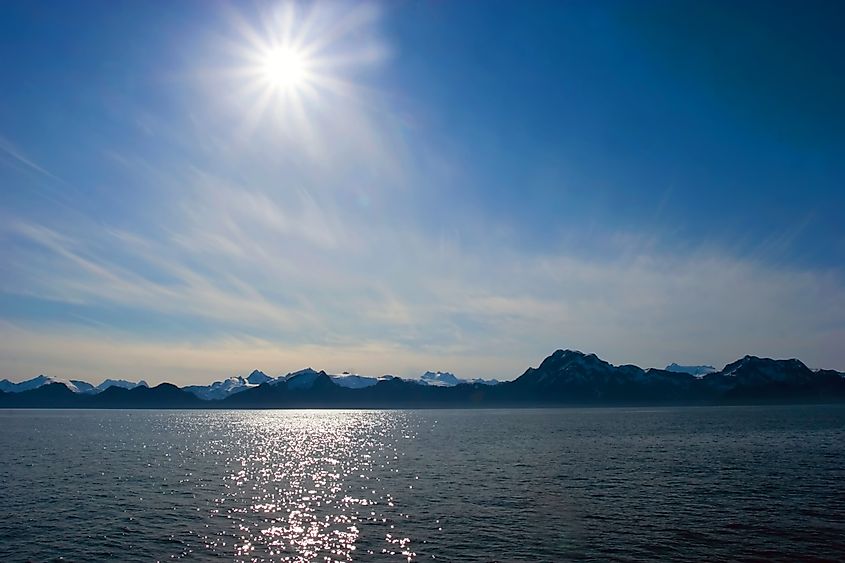 Midnight sun over the mountains in Alaska.