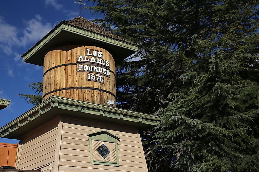 A small wooden water tower in Los Alamos, California.