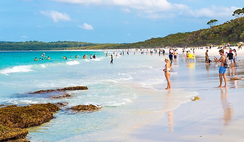 People enjoying the sunny weather at Hyams Beach on Jervis Bay.