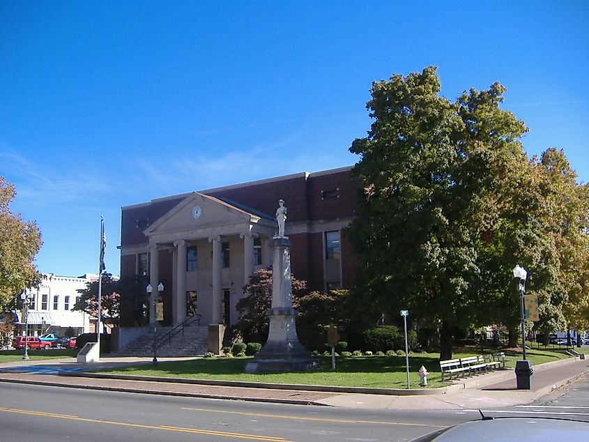 Hopkins County Courthouse in Madisonville with pillars and a clock tower. Editorial Credit: By C. Bedford Crenshaw, 