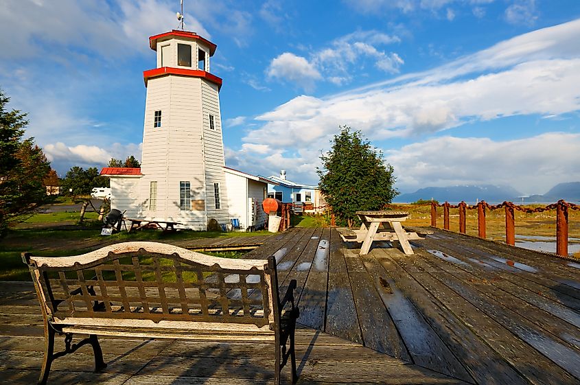 Homer Spit Lighthouse at sunset in Homer, Alaska.