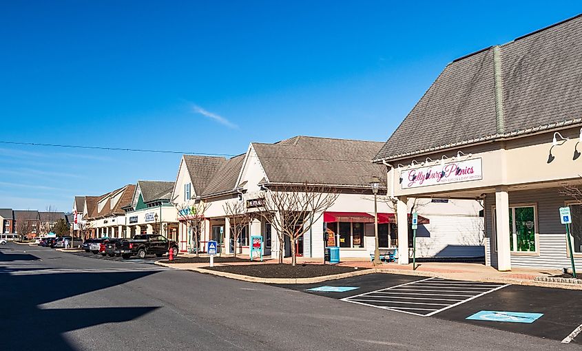 The Outlet Shoppes at Gettysburg, an outdoor mall on a sunny winter day. Editorial credit: woodsnorthphoto / Shutterstock.com