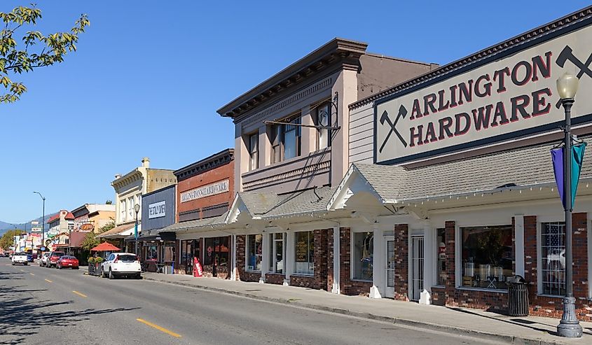 North Olympic Avenue in Arlington Washington with local businesses under blue sky