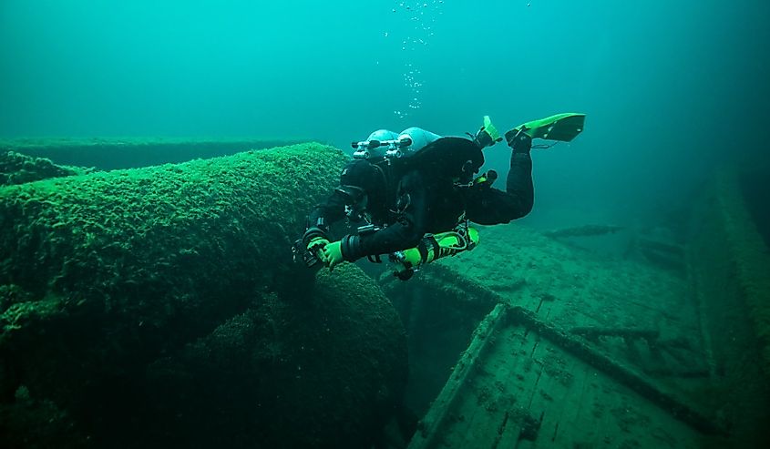 Diver exploring the shipwreck, Dolphin in the Straits of Mackinac.