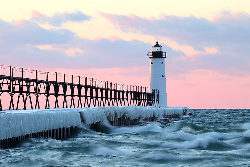 Manistee North Pier Lighthouse (1889) at sunset, Manistee, Lake Michigan, Michigan, USA.